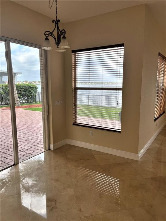 17989 Southwest 54th Street Miramar, FL 33029 - Photo 12 of 53 a view of an empty room with a window