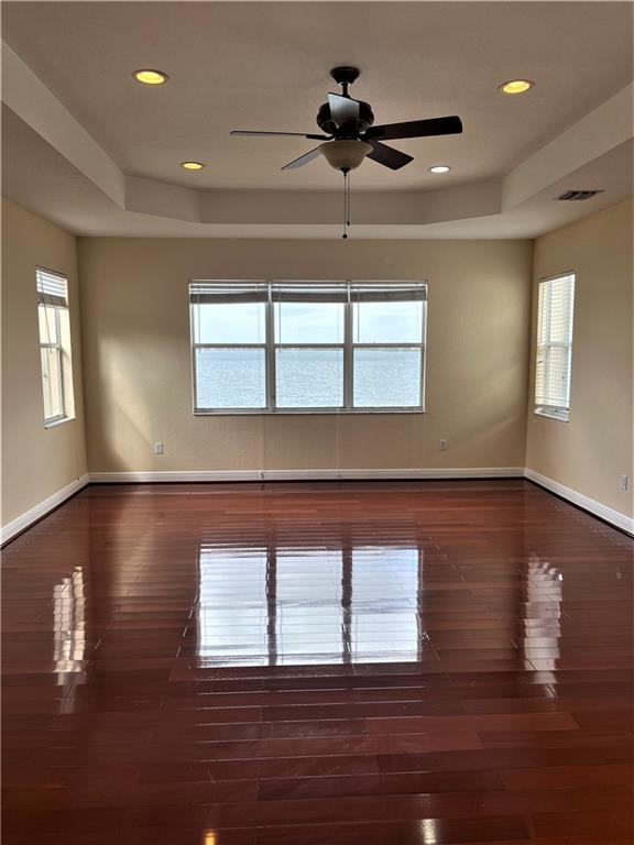 17989 Southwest 54th Street Miramar, FL 33029 - Photo 23 of 53 a view of empty room with wooden floor and fan
