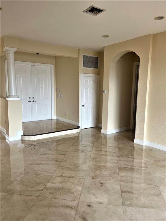 17989 Southwest 54th Street Miramar, FL 33029 - Photo 4 of 53 a view of empty room with wooden floor