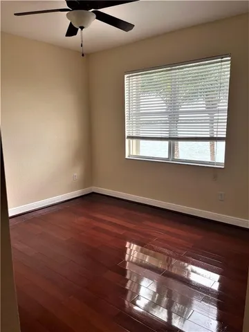 a view of front door with wooden floor