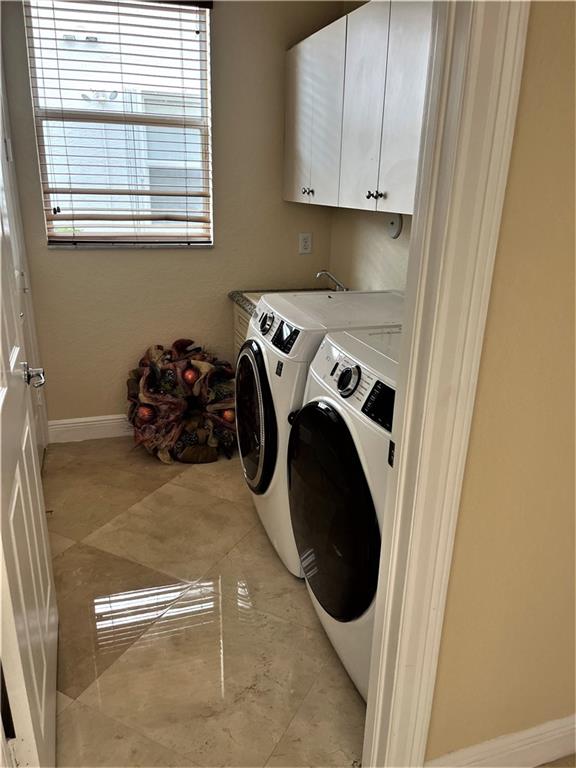 17989 Southwest 54th Street Miramar, FL 33029 - Photo 47 of 53 a utility room with sink dryer and washer