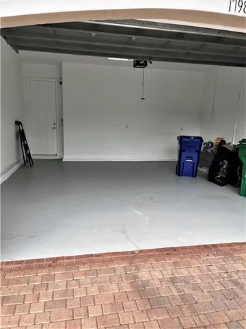 a view of a room with rack and wooden floor