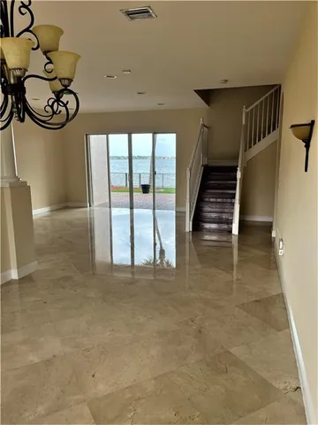 a view of an entryway with a floor