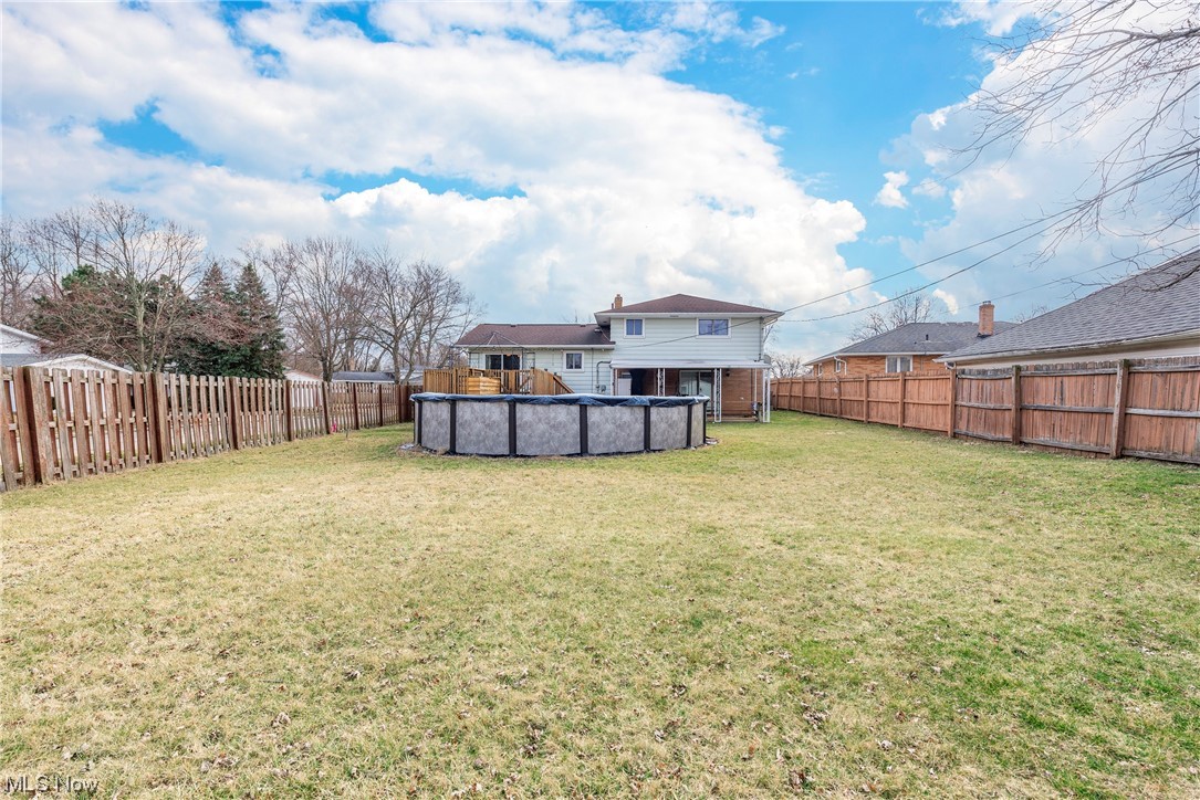 7094 Brandywine Road Parma Heights, OH 44130 - Photo 8 of 49 View of yard with a fenced in pool