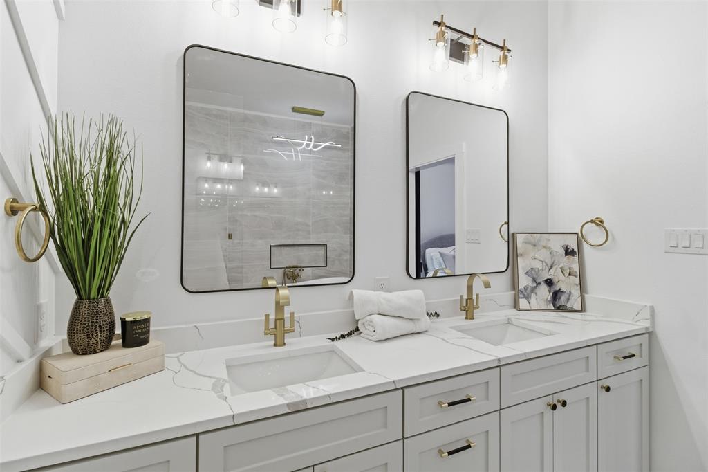 435 Waterboard Road Trinidad, TX 75163 - Photo 30 of 39 Dual vanity with gold-finish faucets and hardware