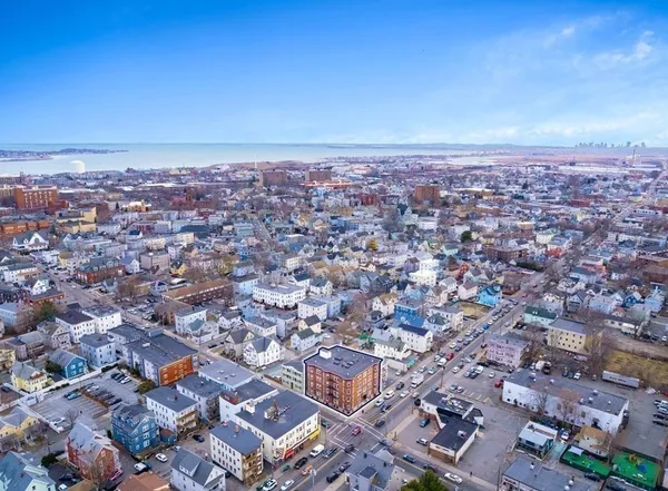 an aerial view of a city with lots of residential buildings