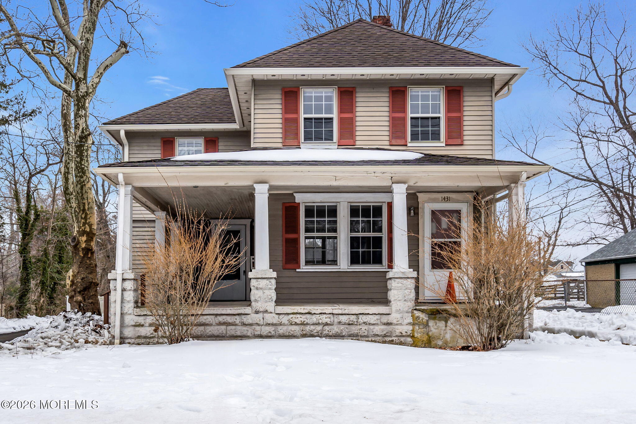 a front view of a house with a porch