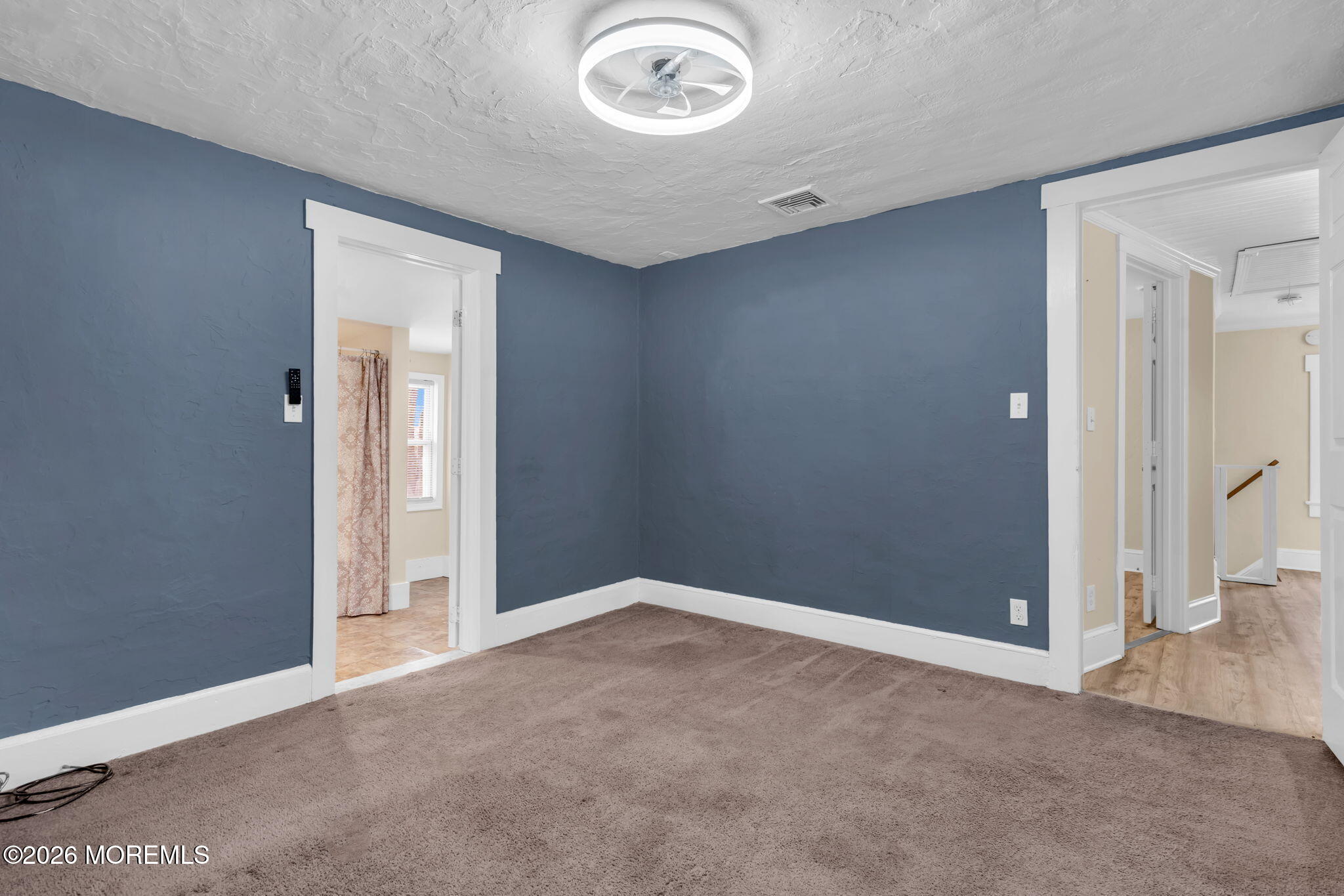 1431 Marconi Road Wall, NJ 07719 - Photo 24 of 36 an empty room with entryway