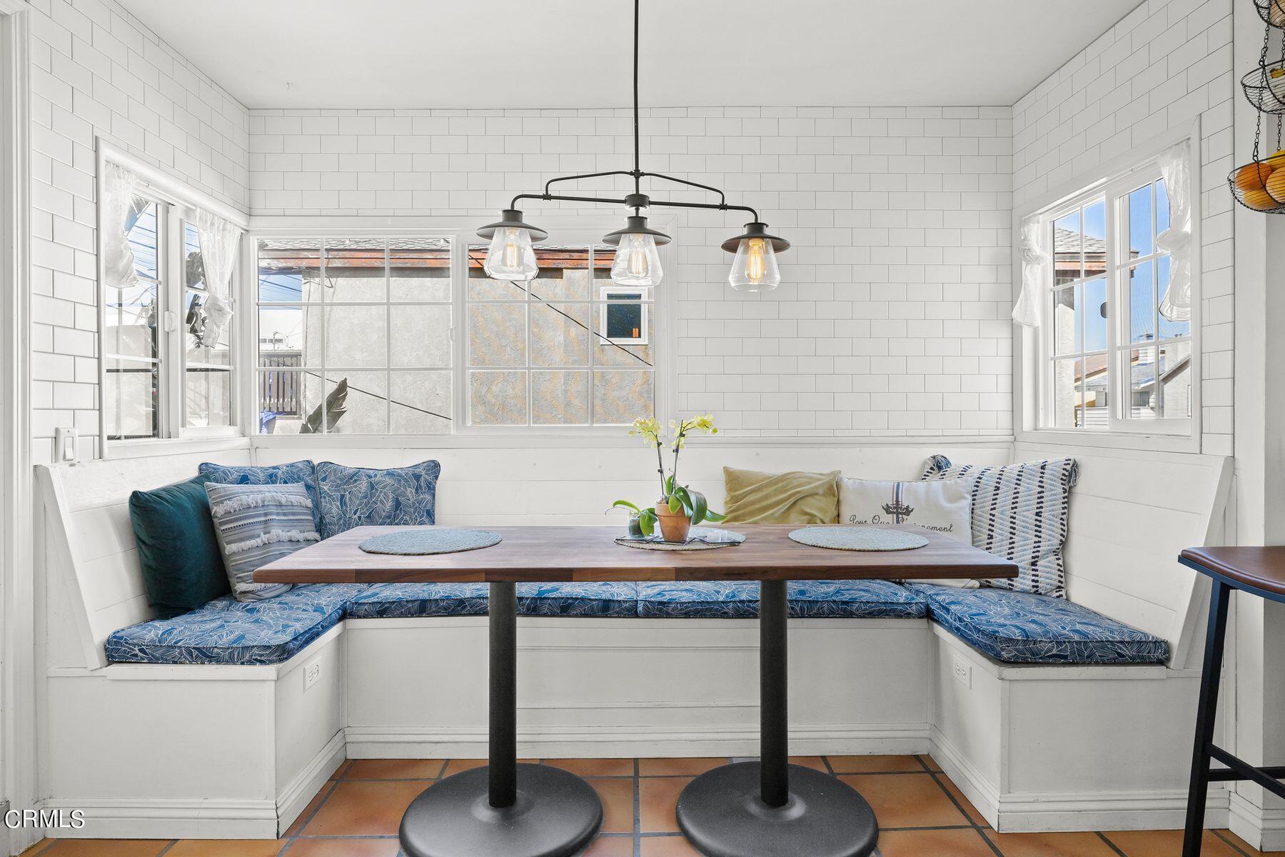 248 Cahuenga Drive Oxnard, CA 93035 - Photo 13 of 28 a living room with granite countertop furniture and a table