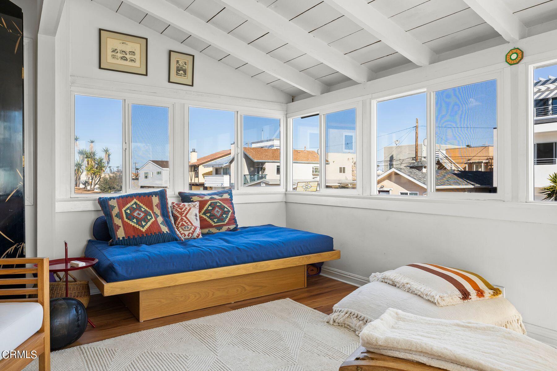 248 Cahuenga Drive Oxnard, CA 93035 - Photo 2 of 28 a bedroom with furniture and a wooden floor