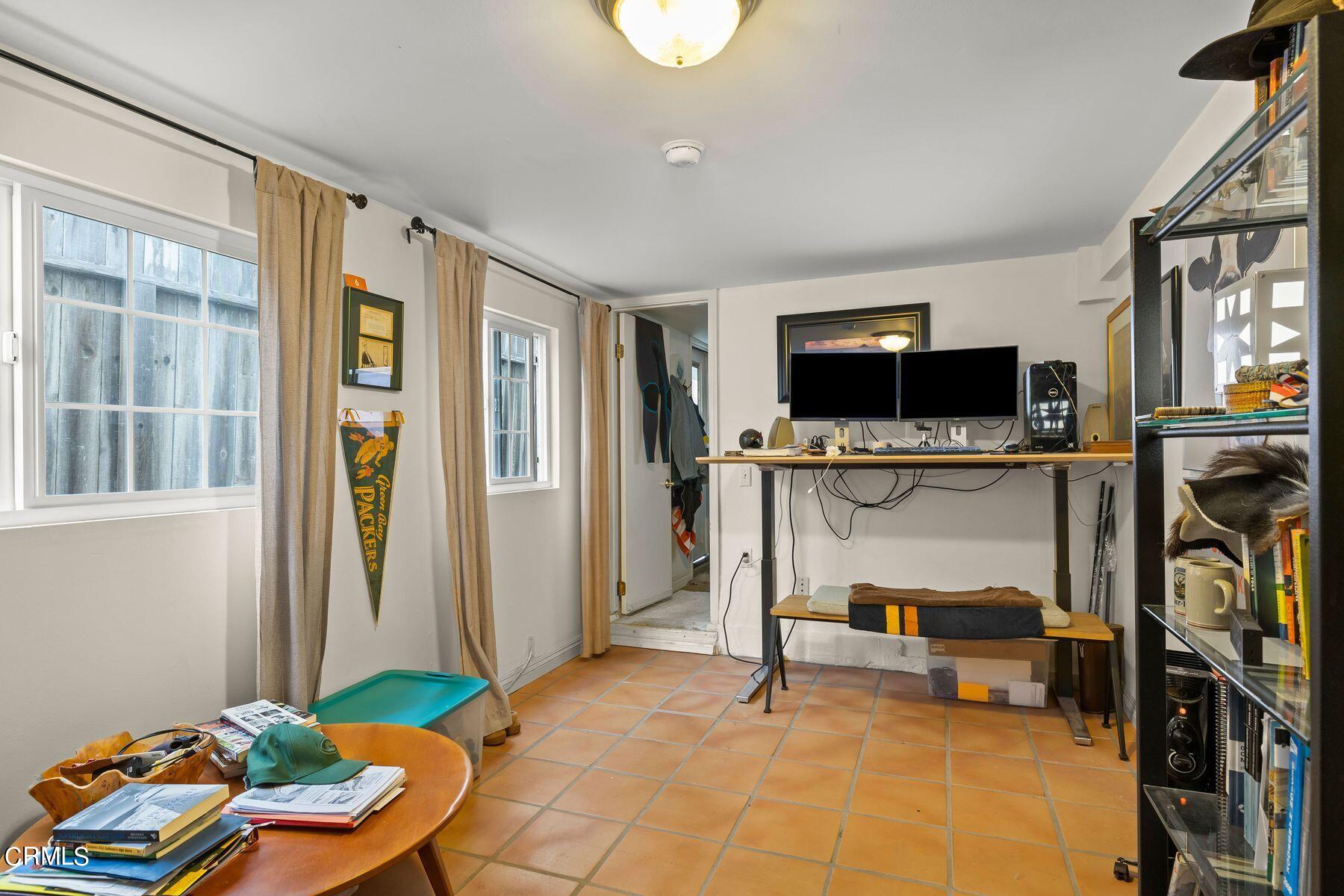 248 Cahuenga Drive Oxnard, CA 93035 - Photo 21 of 28 a bedroom with furniture and a flat screen tv