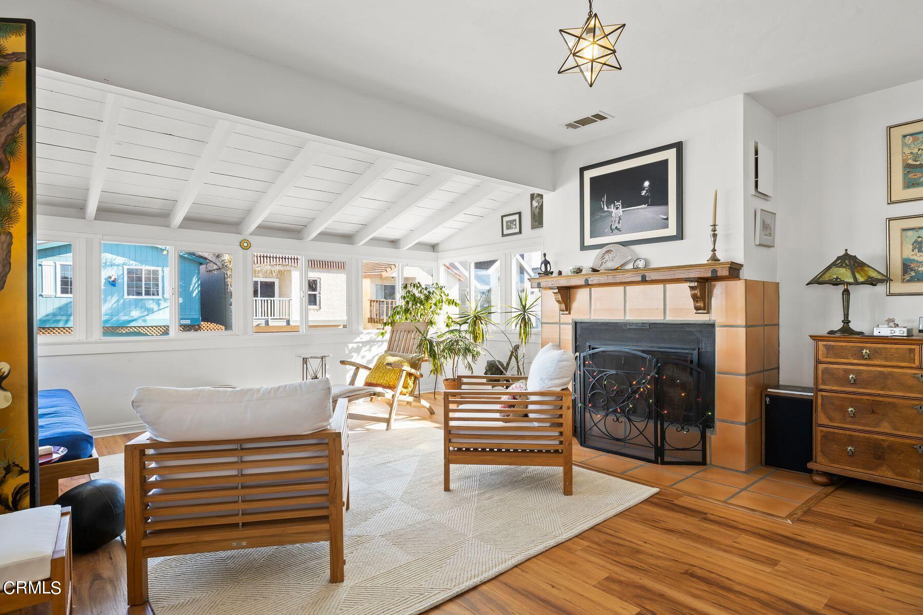 248 Cahuenga Drive Oxnard, CA 93035 - Photo 3 of 28 a living room with furniture and a fireplace