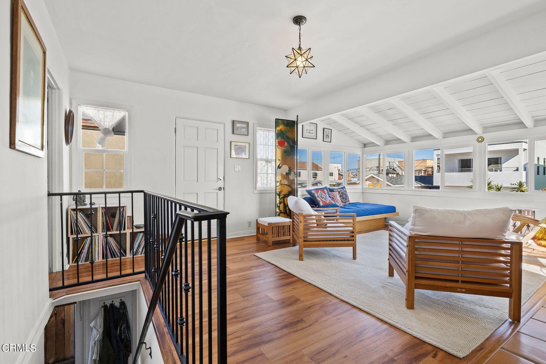 248 Cahuenga Drive Oxnard, CA 93035 - Photo 5 of 28 a living room with furniture and a wooden floor