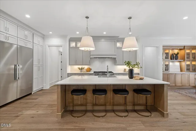 a view of a room with wooden floor