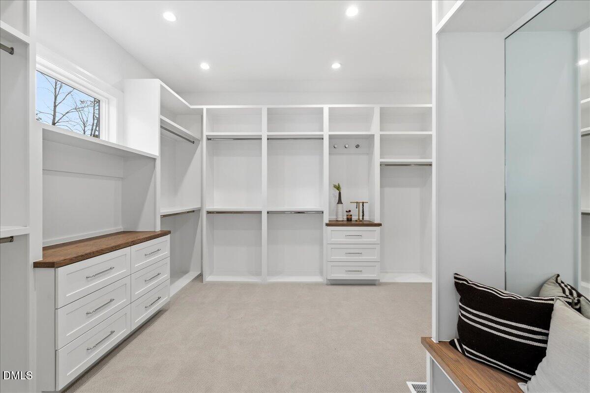 7309 Grist Mill Road Raleigh, NC 27615 - Photo 41 of 73 a view of an empty walk in closet