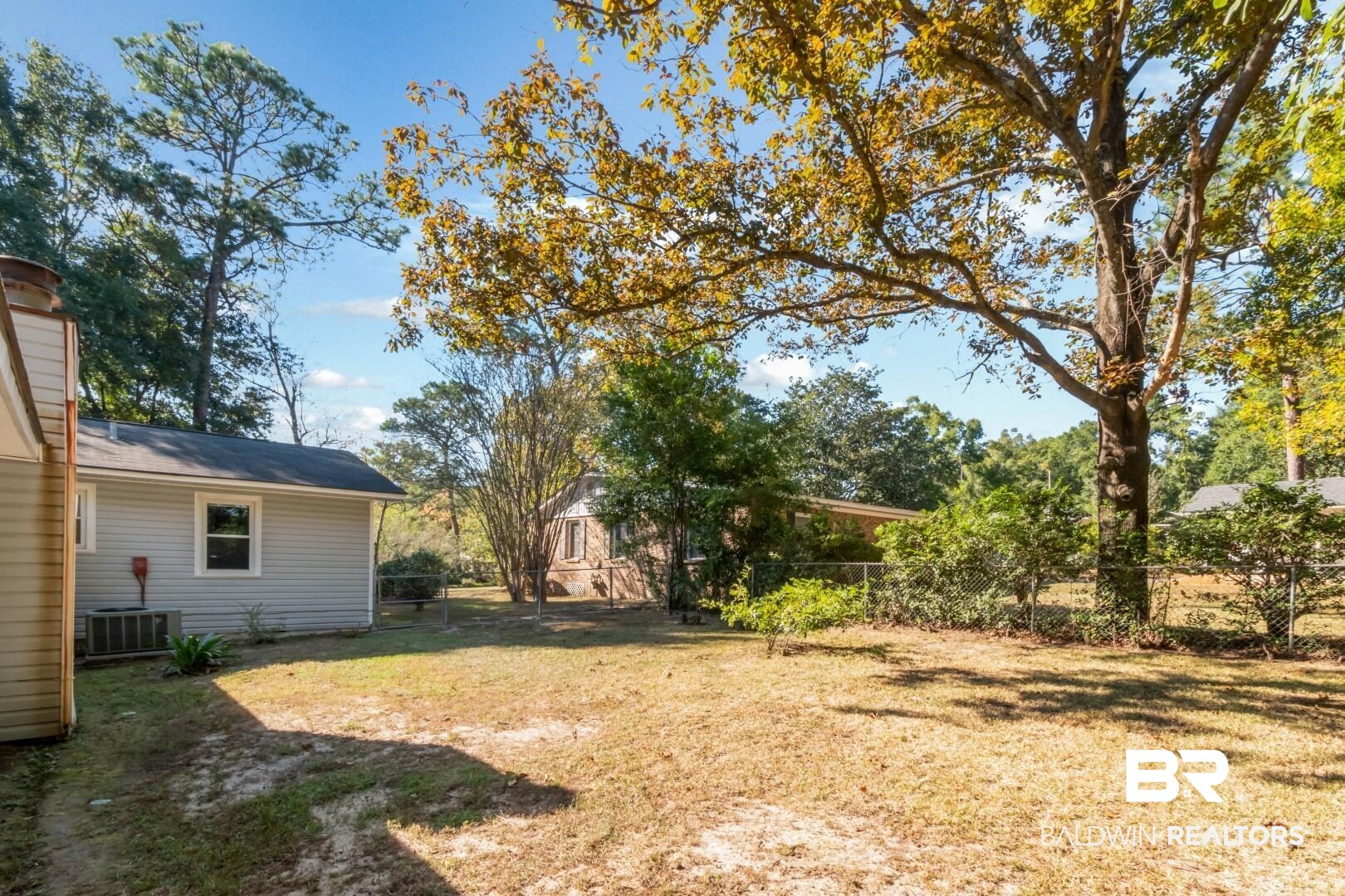 1321 Rainbow Drive West Mobile, AL 36693 - Photo 38 of 48 View of yard featuring central air condition unit