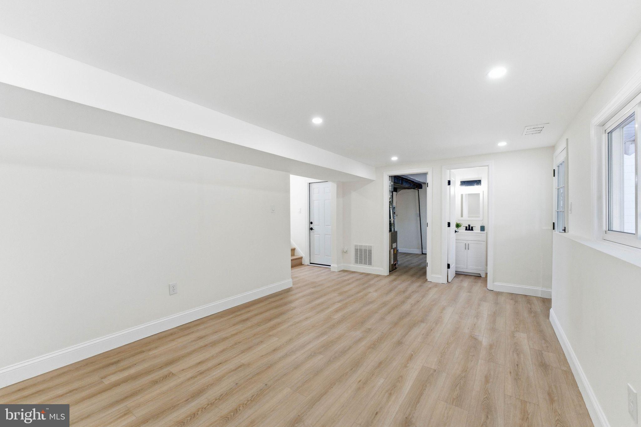 16 Saratoga Road Stratford, NJ 08084 - Photo 20 of 34 a view of empty room with wooden floor
