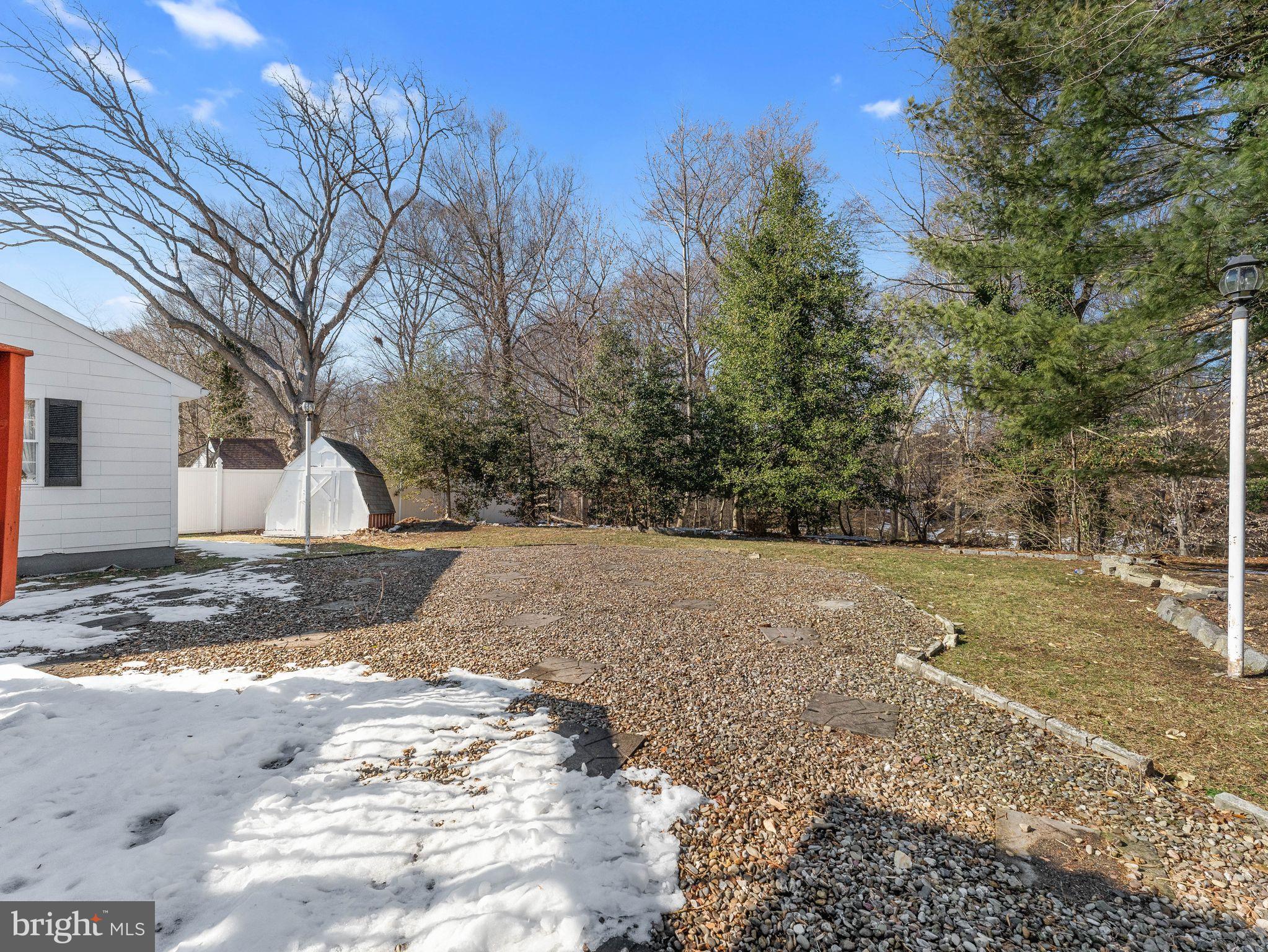16 Saratoga Road Stratford, NJ 08084 - Photo 29 of 34 a view of a yard with a tree