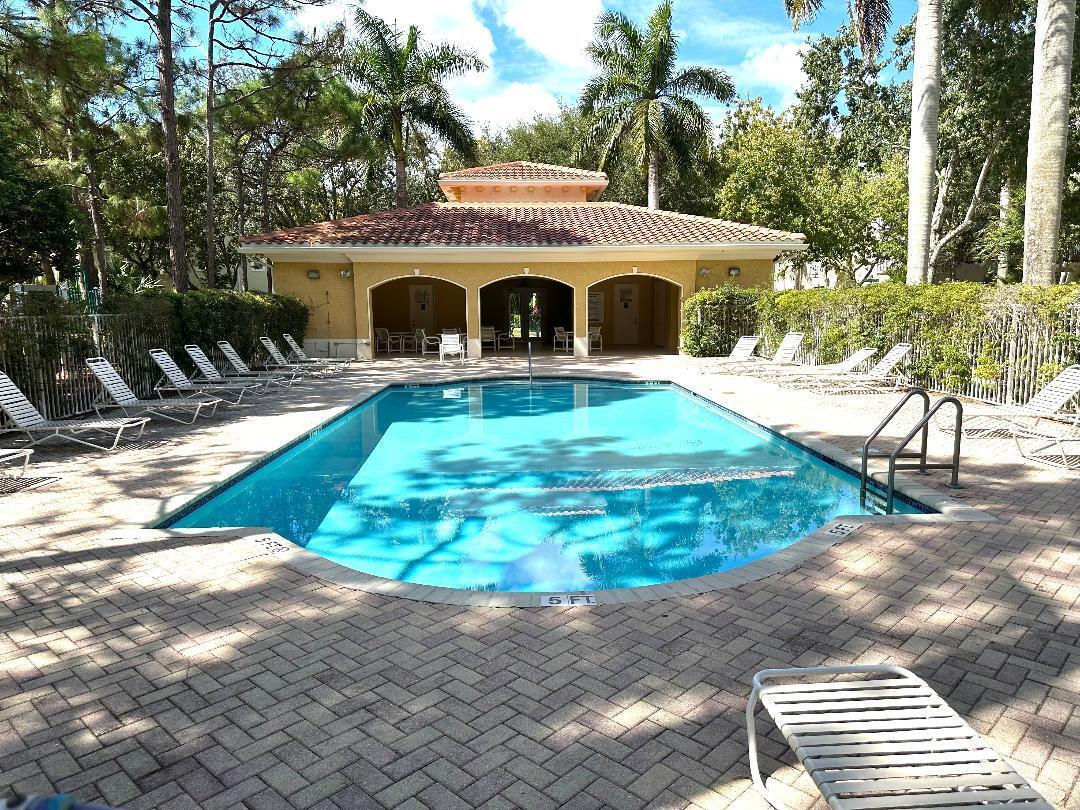 808 University Boulevard Jupiter, FL 33458 - Photo 16 of 16 a view of outdoor space yard and swimming pool