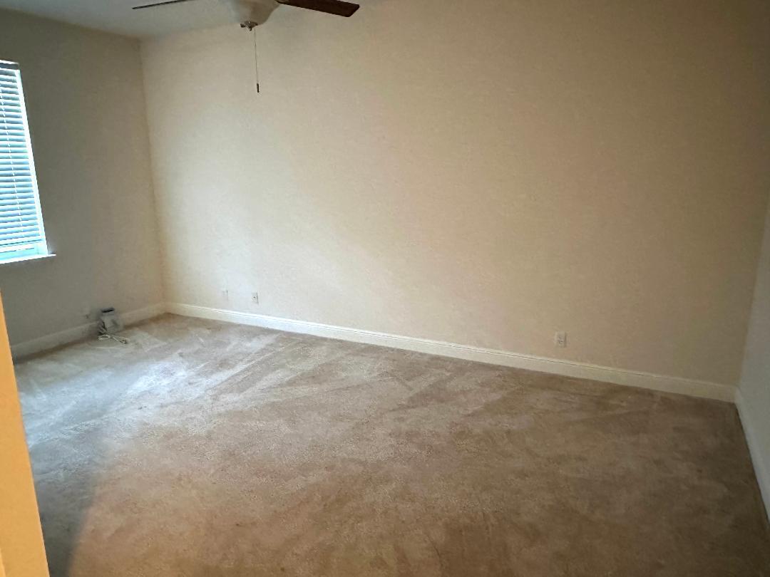 808 University Boulevard Jupiter, FL 33458 - Photo 3 of 16 a view of an empty room and a window