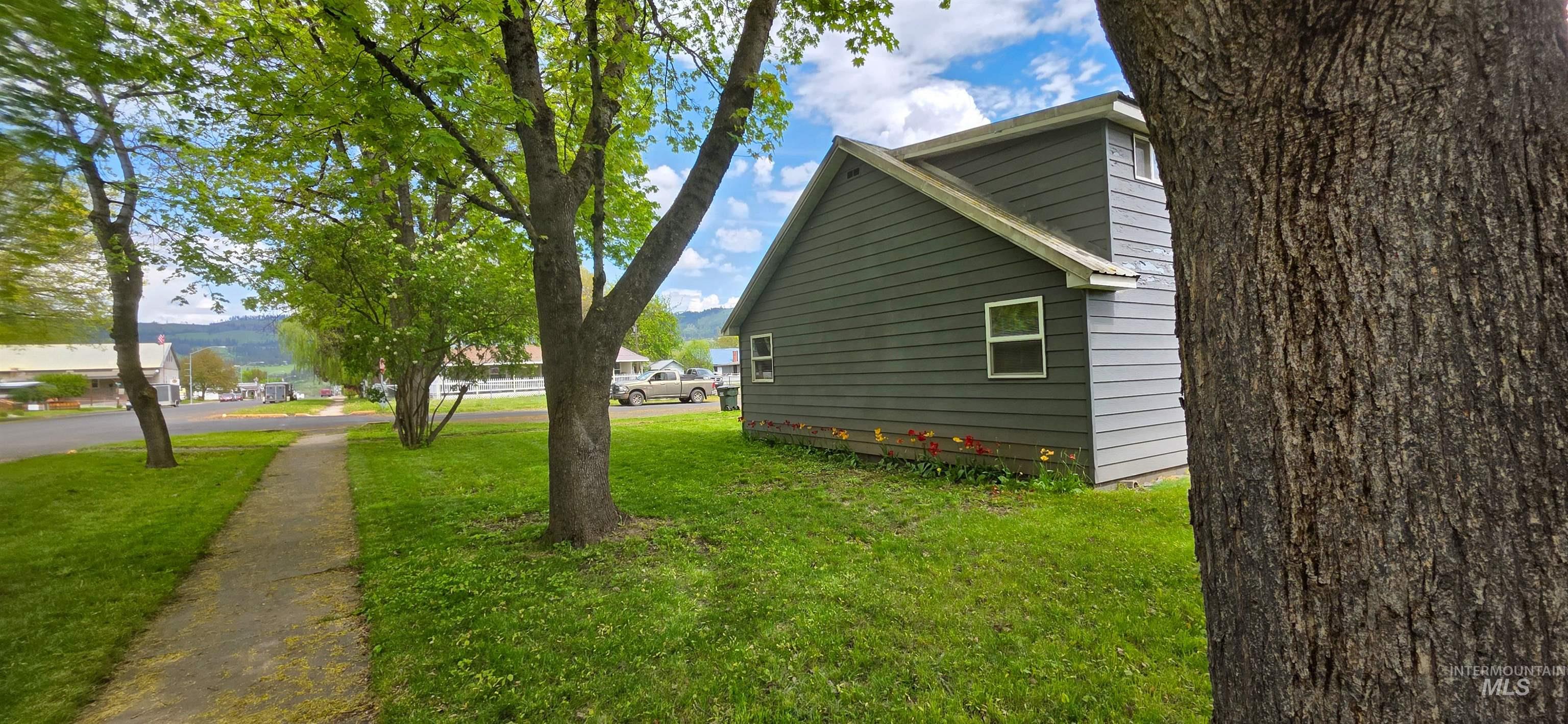 515 8th Street Kamiah, ID 83536 - Photo 28 of 31 Property exterior featuring horizontal siding, white trim windows, and a light gray roofline