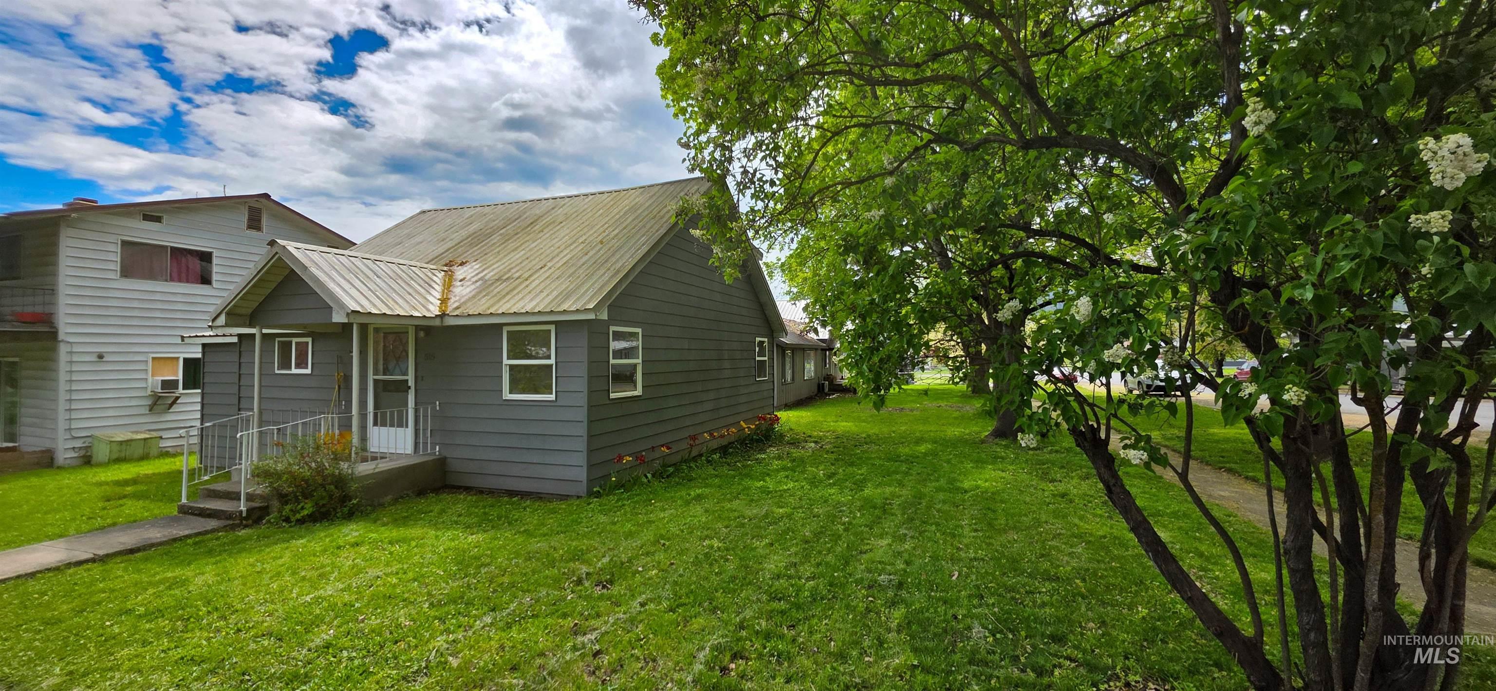 515 8th Street Kamiah, ID 83536 - Photo 29 of 31 Single-story residence featuring gray siding and a metal roof