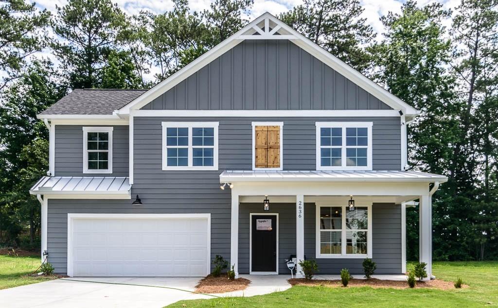 2636 Radvell Court Decatur, GA 30034 - Photo 1 of 1 a front view of a house with garden