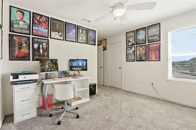 a view of cabinets a washer and dryer