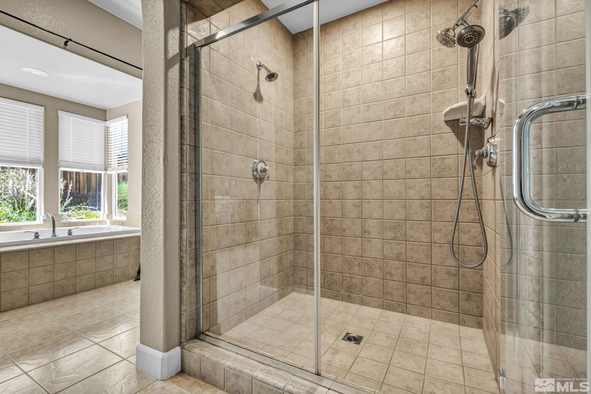 8210 Willow Ranch Trail Reno, NV 89523 - Photo 20 of 38 a bathroom with a shower
