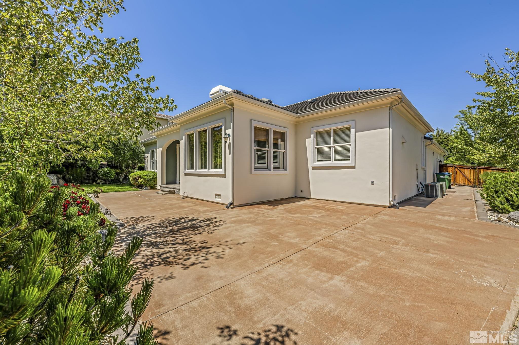 8210 Willow Ranch Trail Reno, NV 89523 - Photo 28 of 38 a view of a house with a yard