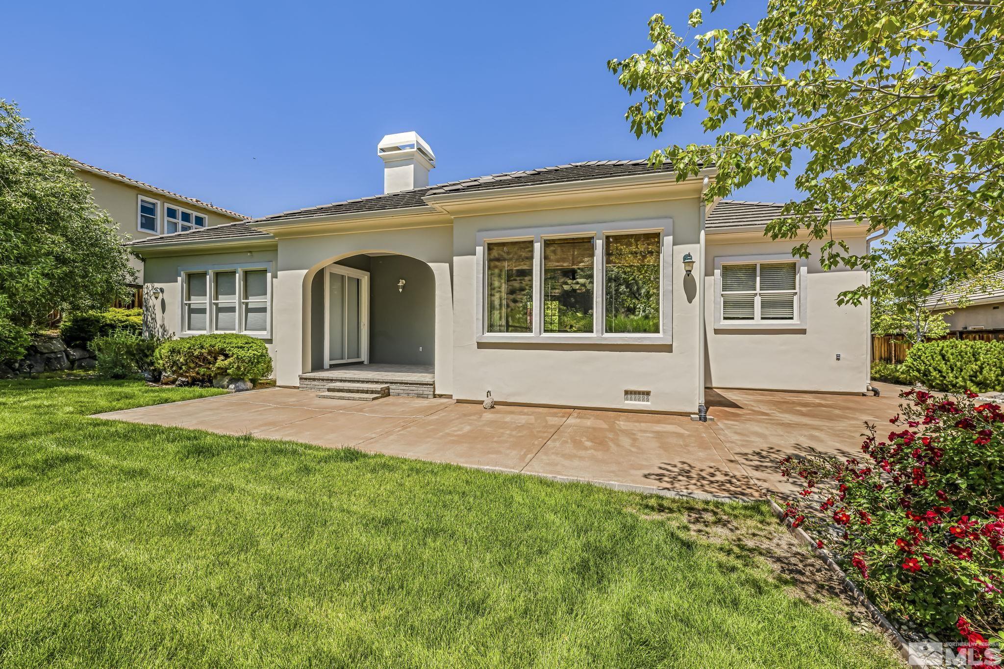 8210 Willow Ranch Trail Reno, NV 89523 - Photo 29 of 38 front view of a house with a yard