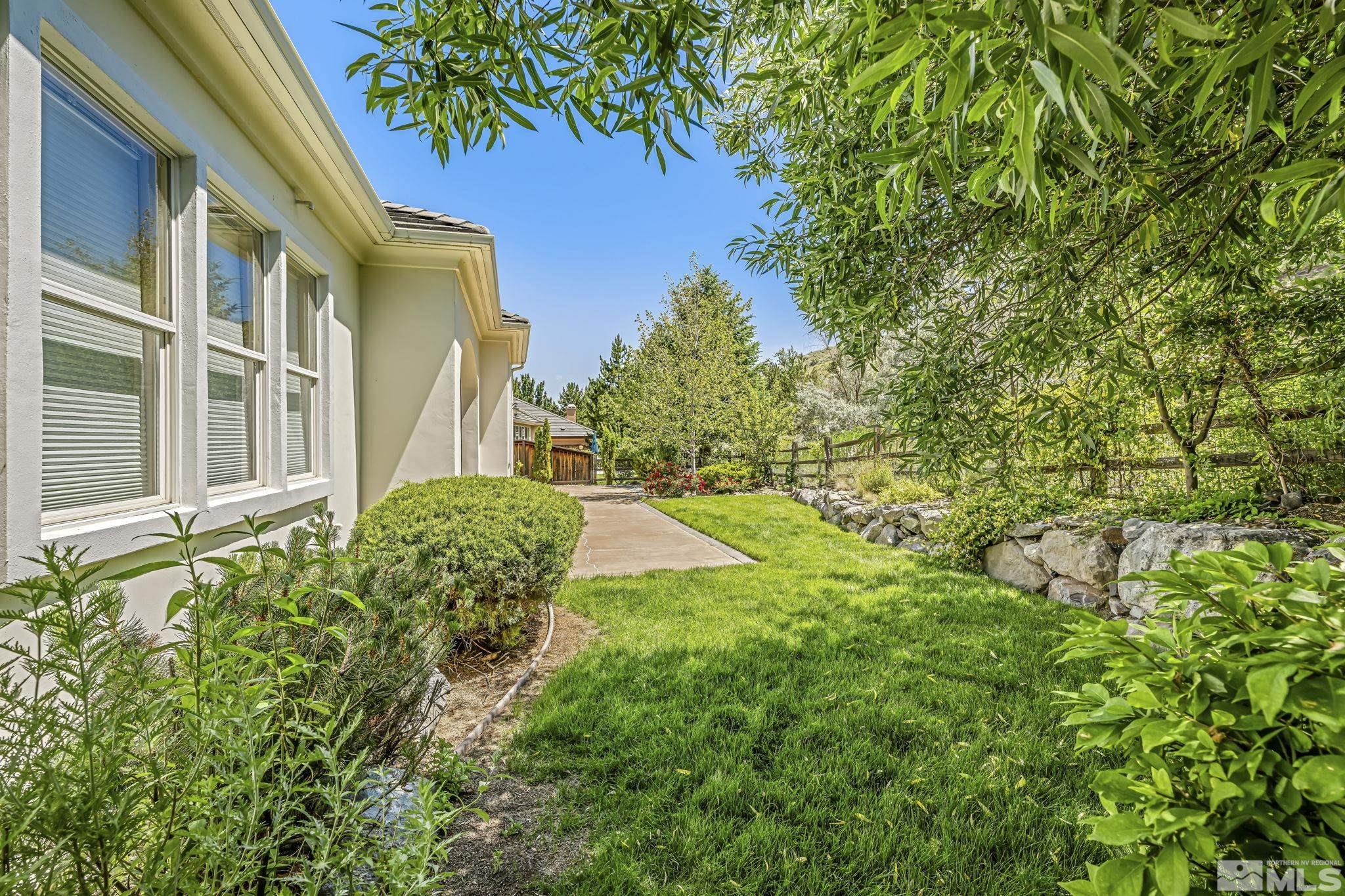 8210 Willow Ranch Trail Reno, NV 89523 - Photo 32 of 38 a view of a garden with plants