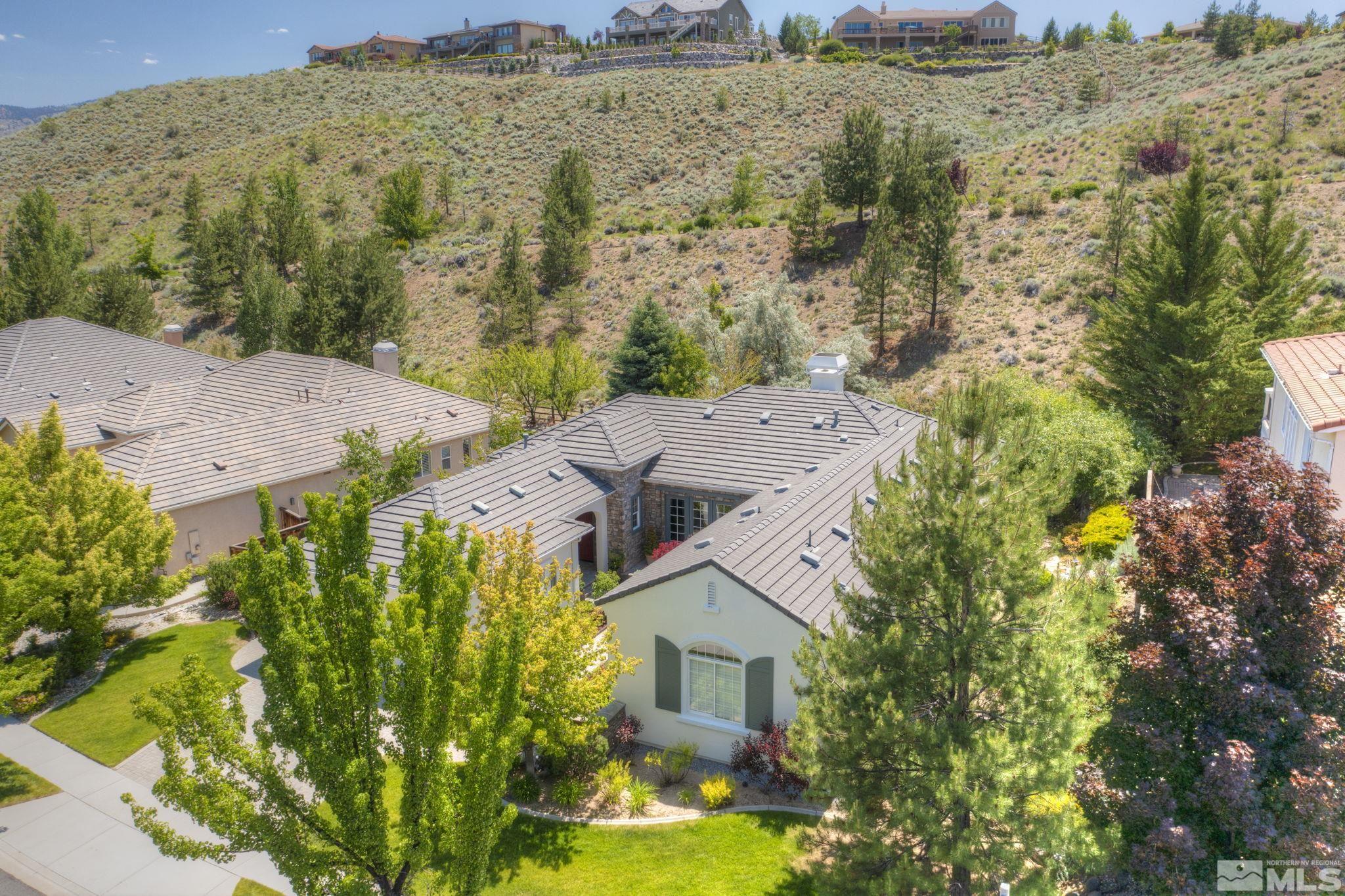 8210 Willow Ranch Trail Reno, NV 89523 - Photo 34 of 38 an aerial view of a house with a mountain