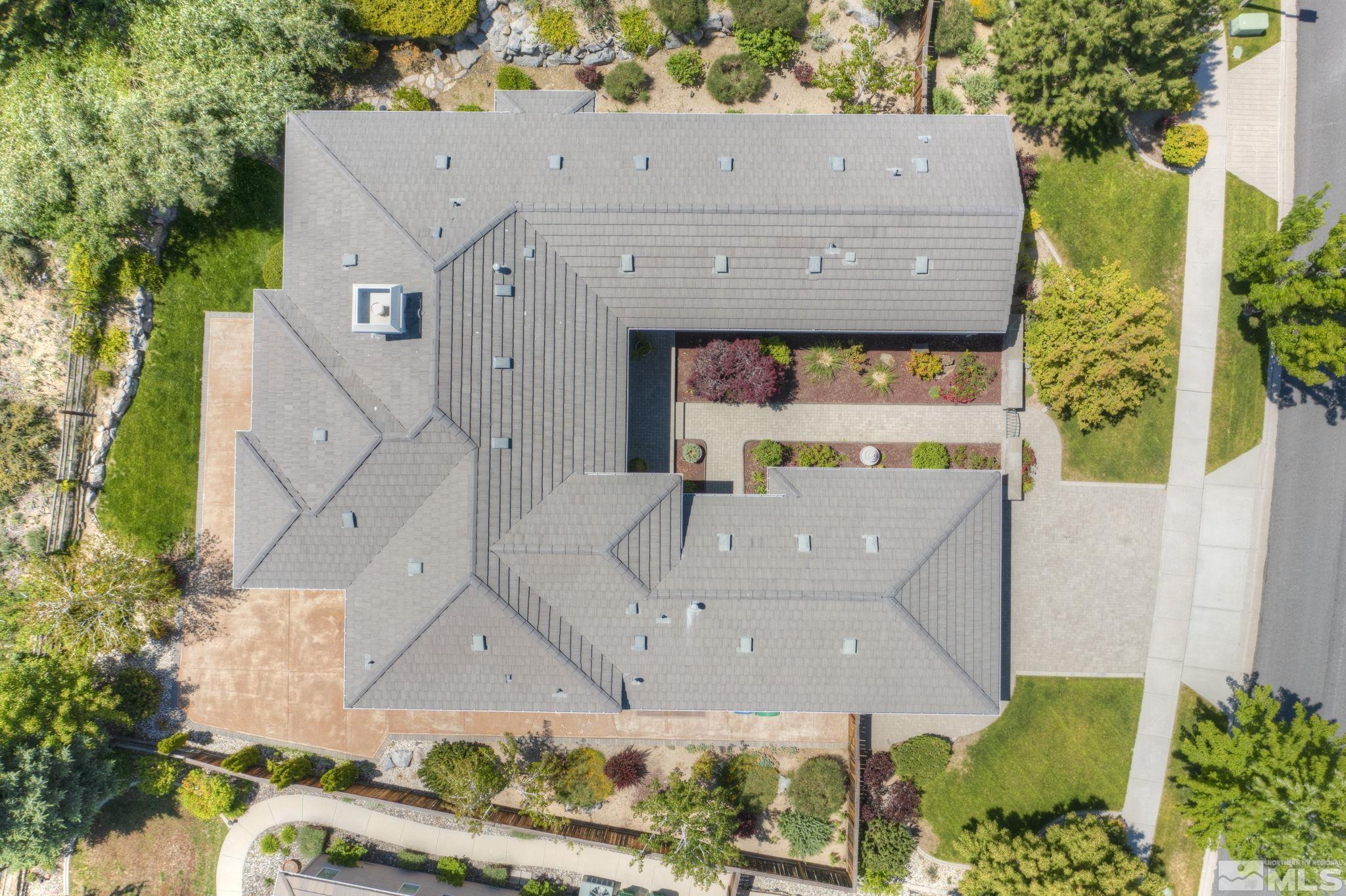 8210 Willow Ranch Trail Reno, NV 89523 - Photo 36 of 38 an aerial view of a house with table and chairs