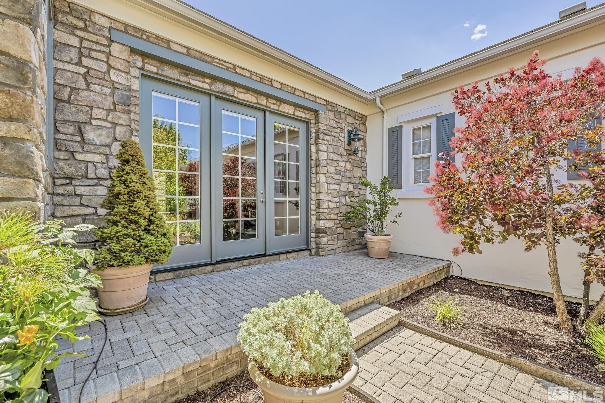 8210 Willow Ranch Trail Reno, NV 89523 - Photo 4 of 38 a view of a porch with a potted plant