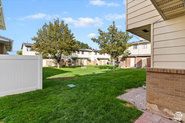 947 Canyon Road South, Unit 15 Ogden, UT 84404 - Photo 21 of 22 View of yard with a patio area