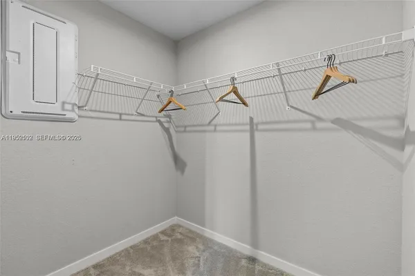 a view of a room with racks on the wall