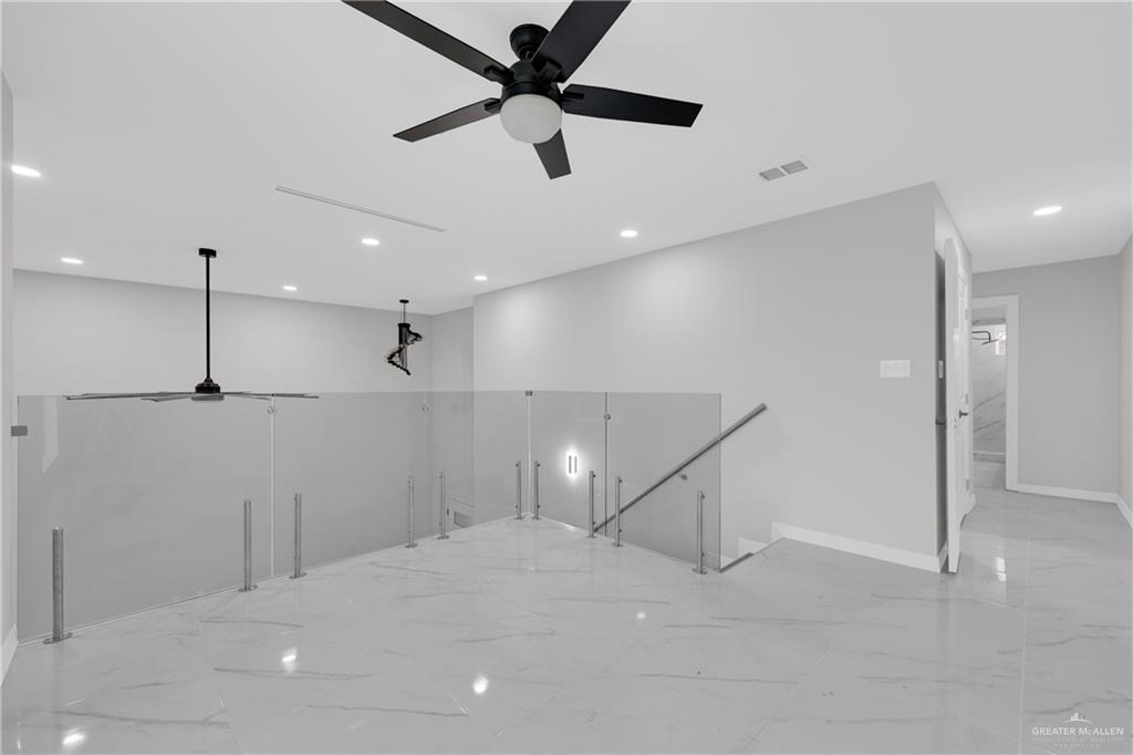 1836 Sunset Drive Mission, TX 78572 - Photo 15 of 24 a view of an empty room and kitchen view