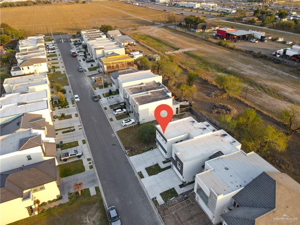 1836 Sunset Drive Mission, TX 78572 - Photo 23 of 24 an aerial view of residential houses with outdoor space