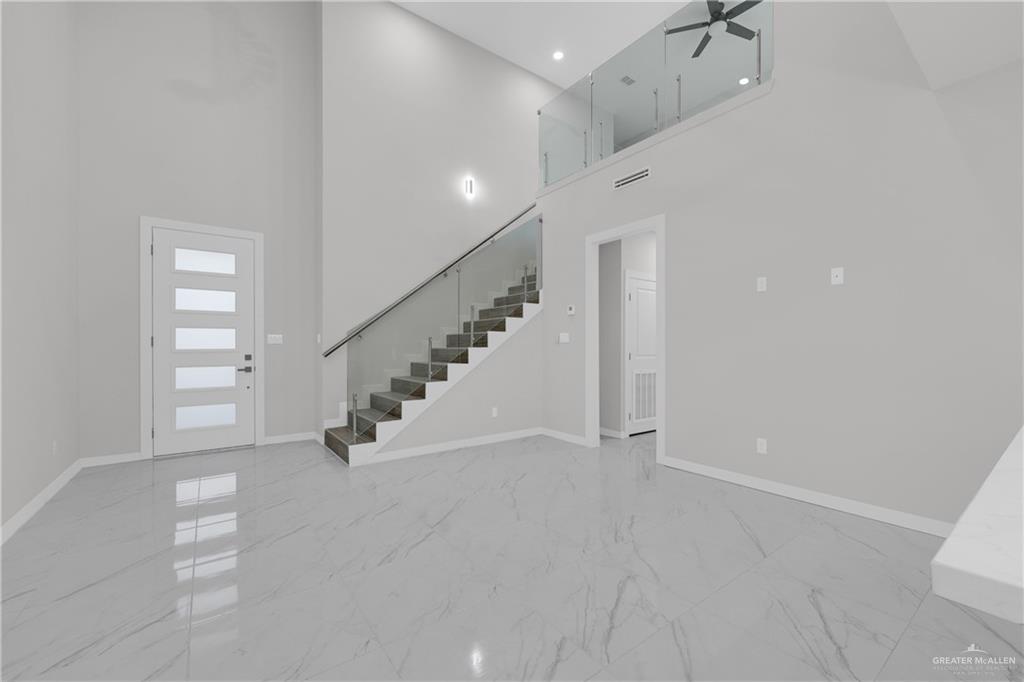 1836 Sunset Drive Mission, TX 78572 - Photo 7 of 24 an entryway in an empty room with a window