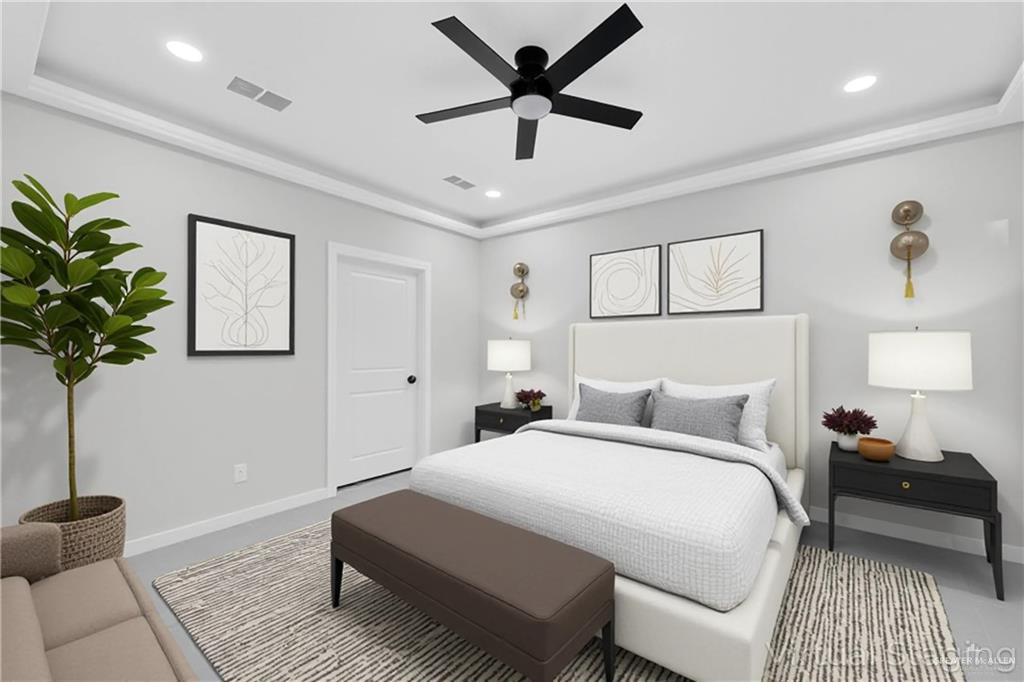 1836 Sunset Drive Mission, TX 78572 - Photo 9 of 24 a bedroom with a bed and a potted plant