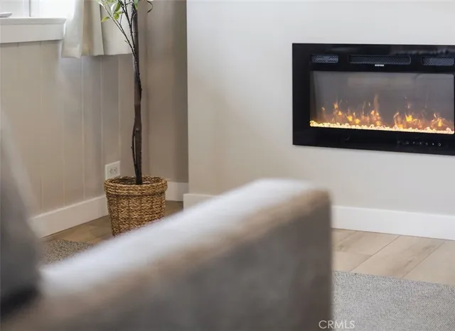 a view of a fireplace with a tv