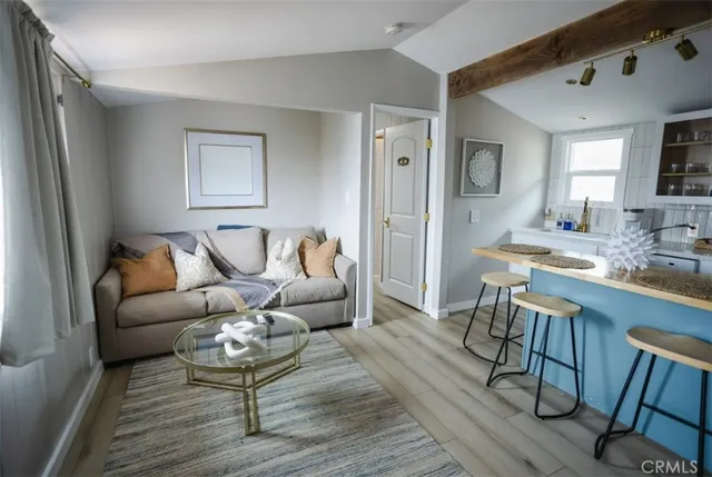 a kitchen with a table and chairs in it