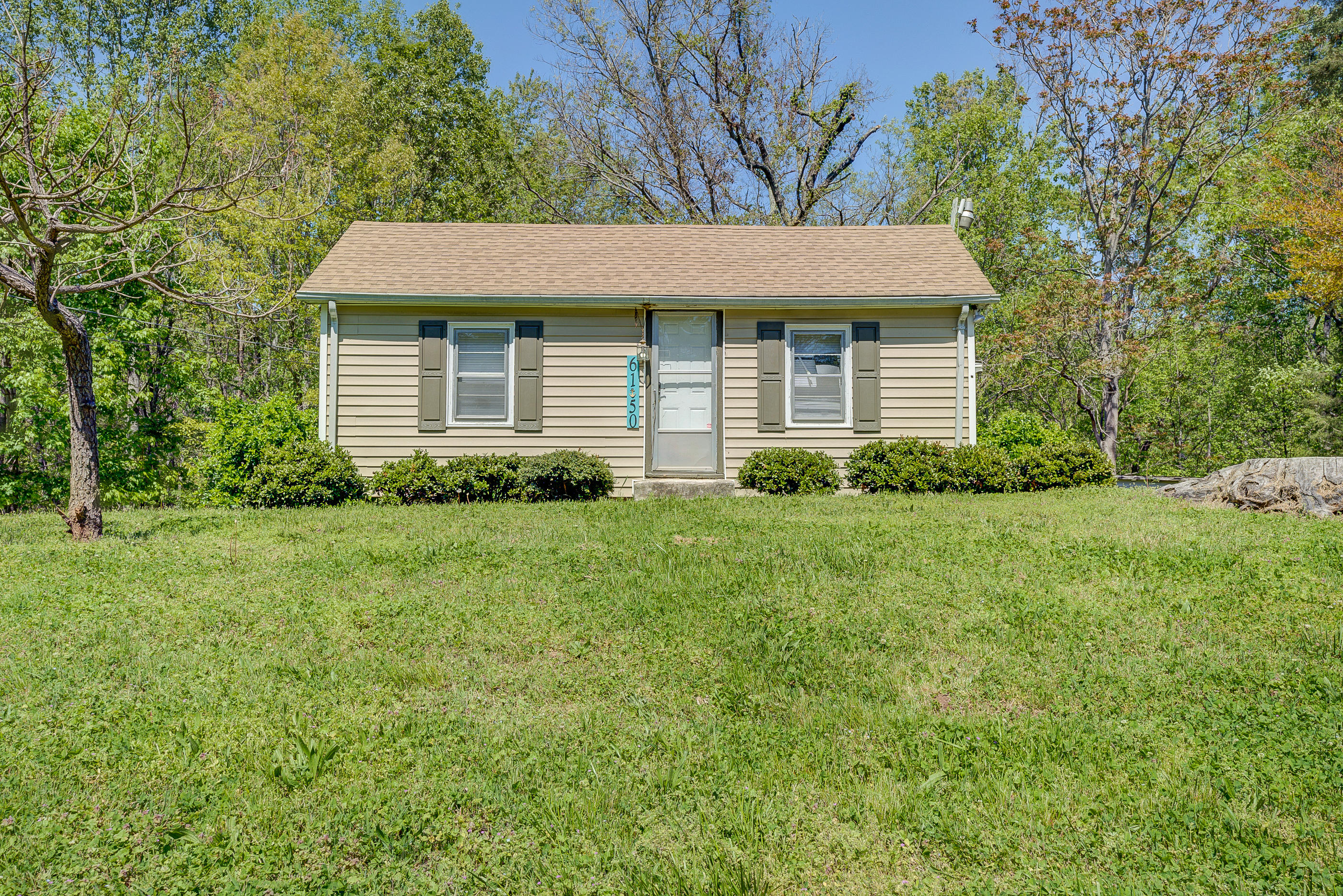 6150 Hardy Road Hardy, VA 24101 - Photo 1 of 17 a front view of a house with a yard