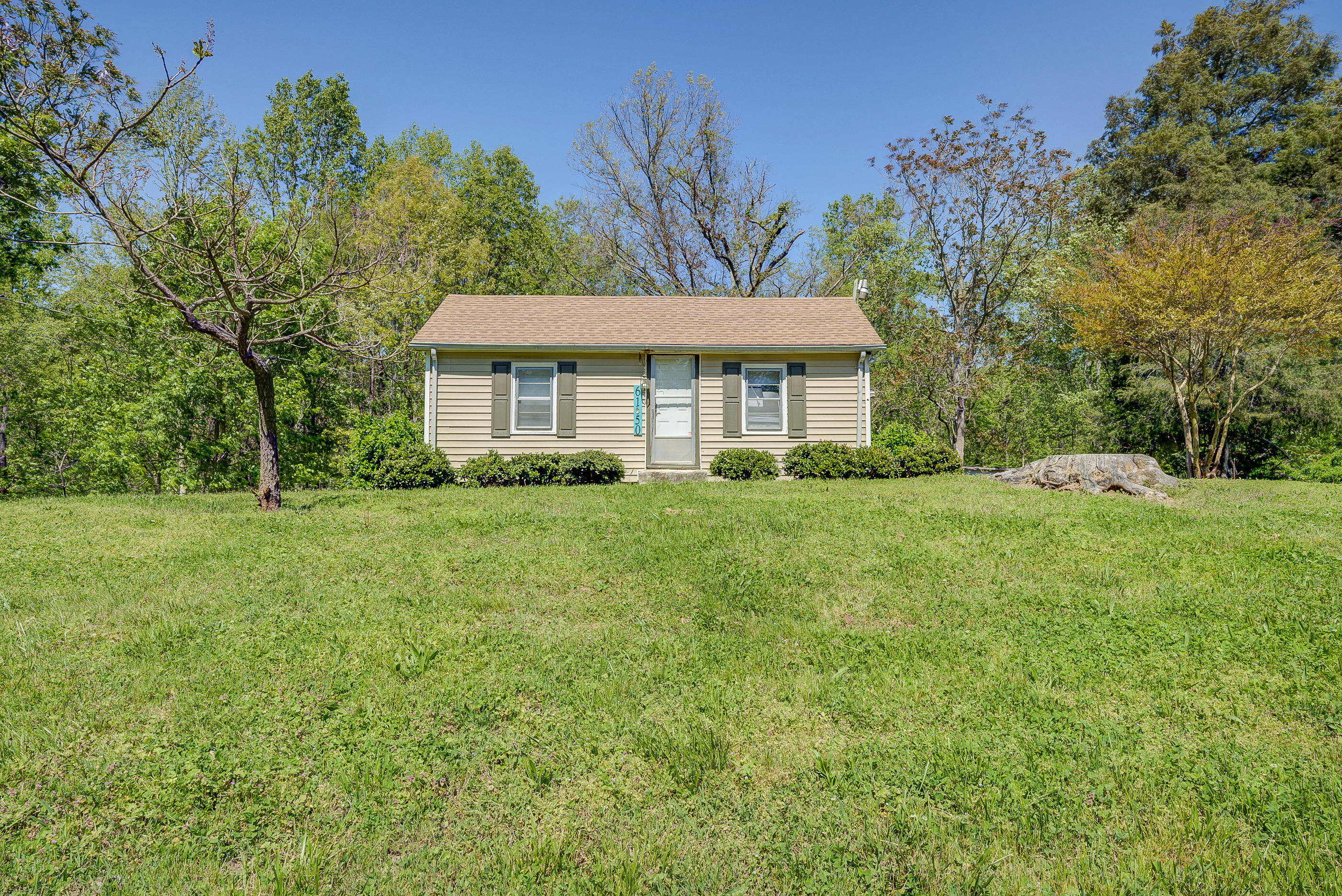 6150 Hardy Road Hardy, VA 24101 - Photo 2 of 17 a front view of a house with a yard