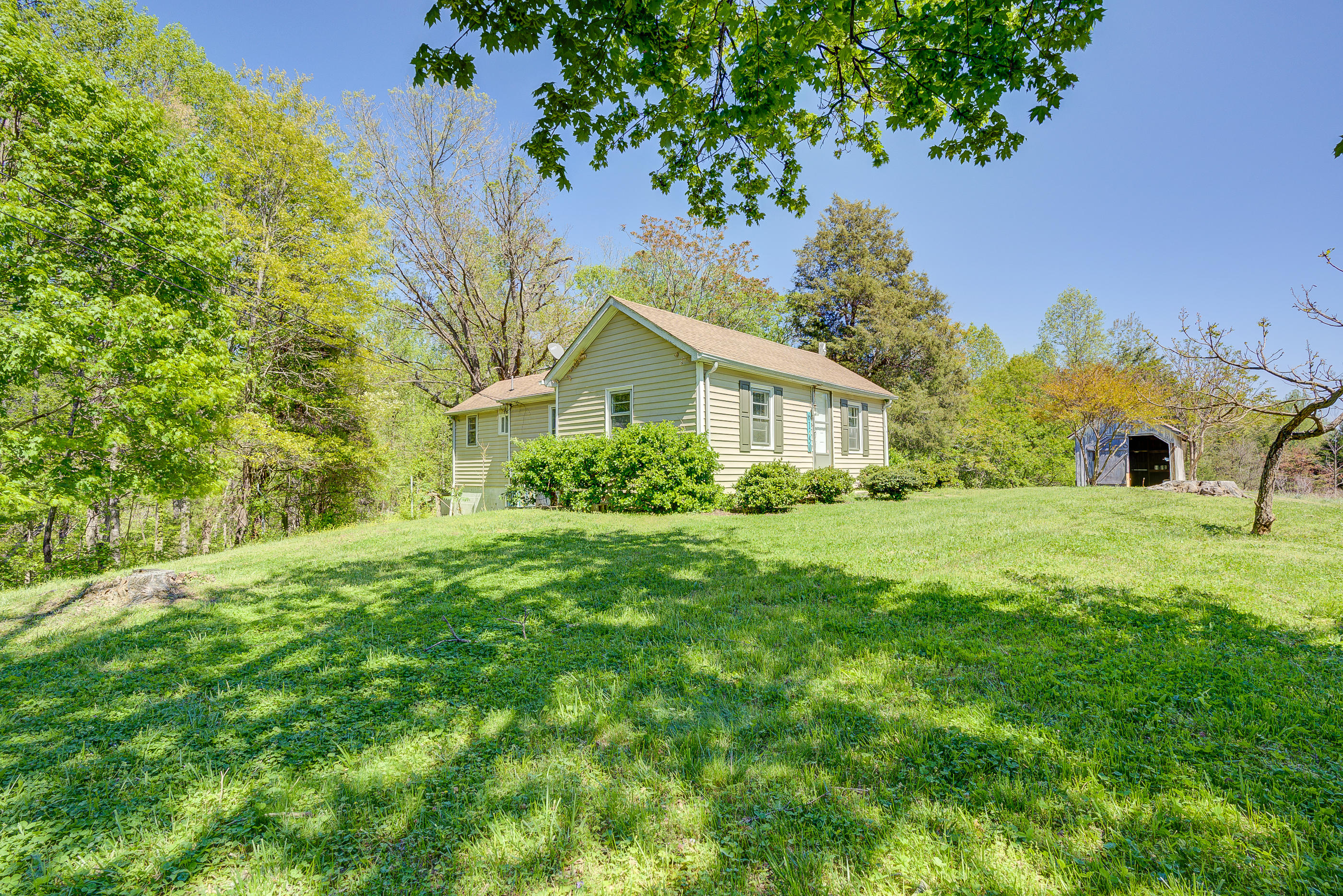 6150 Hardy Road Hardy, VA 24101 - Photo 17 of 17 a front view of a house with garden
