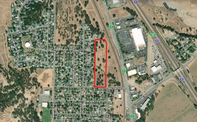 a view of road and trees