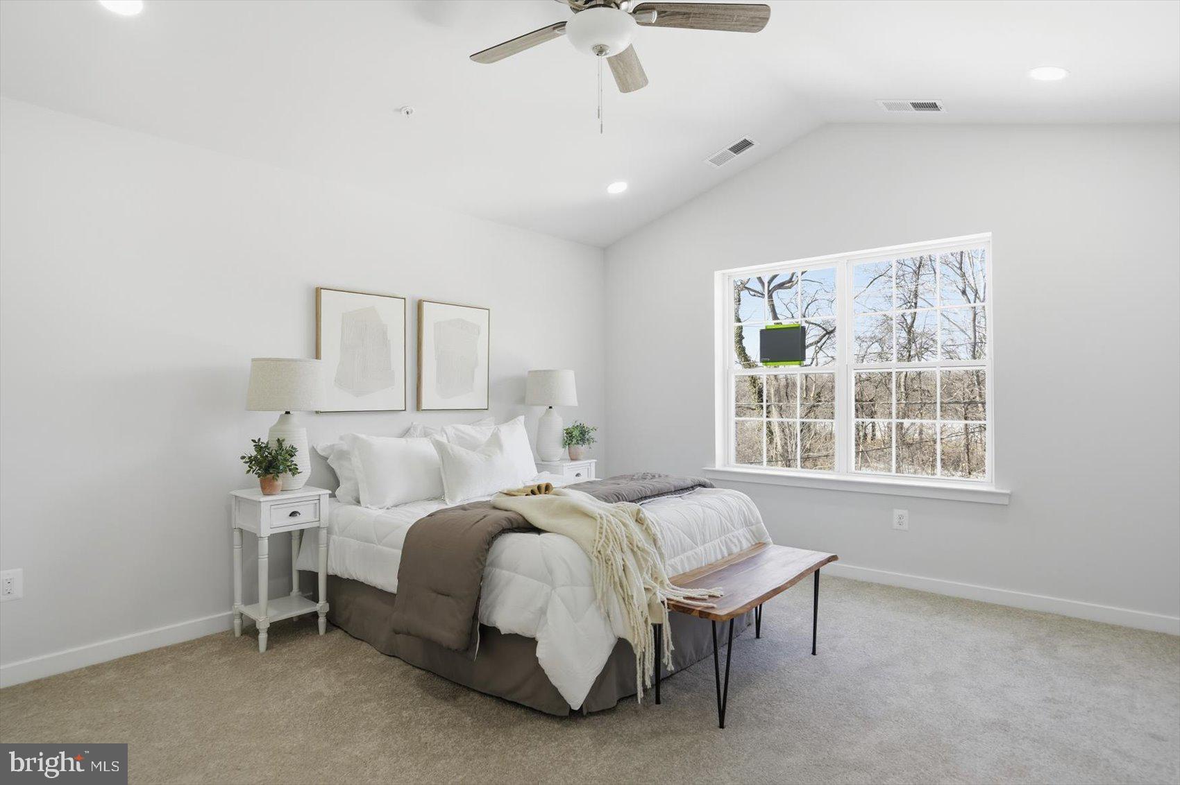 715 Hammonds Lane Baltimore, MD 21225 - Photo 15 of 29 a bed room with a bed and a table