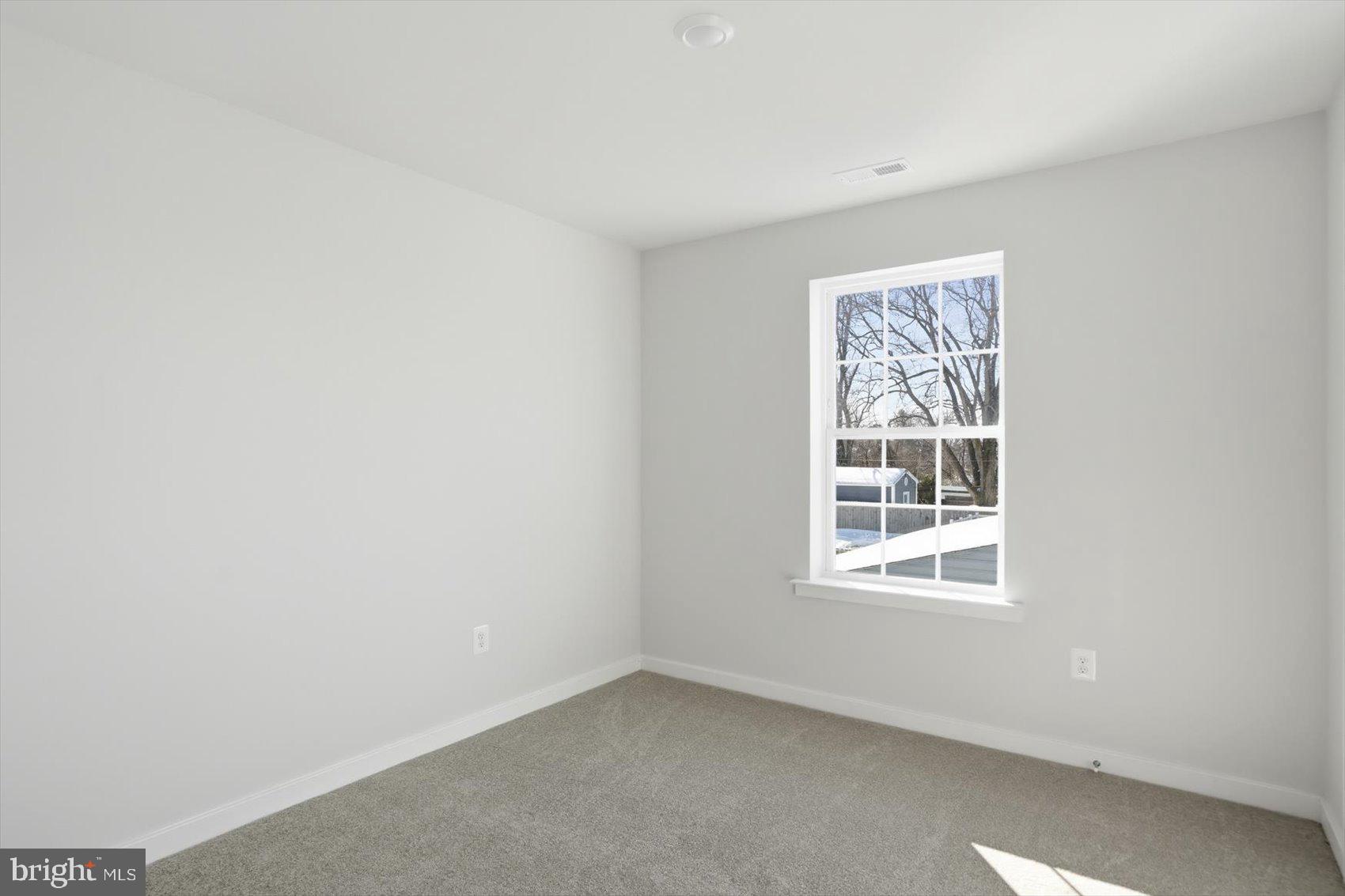 715 Hammonds Lane Baltimore, MD 21225 - Photo 22 of 29 an empty room with a window