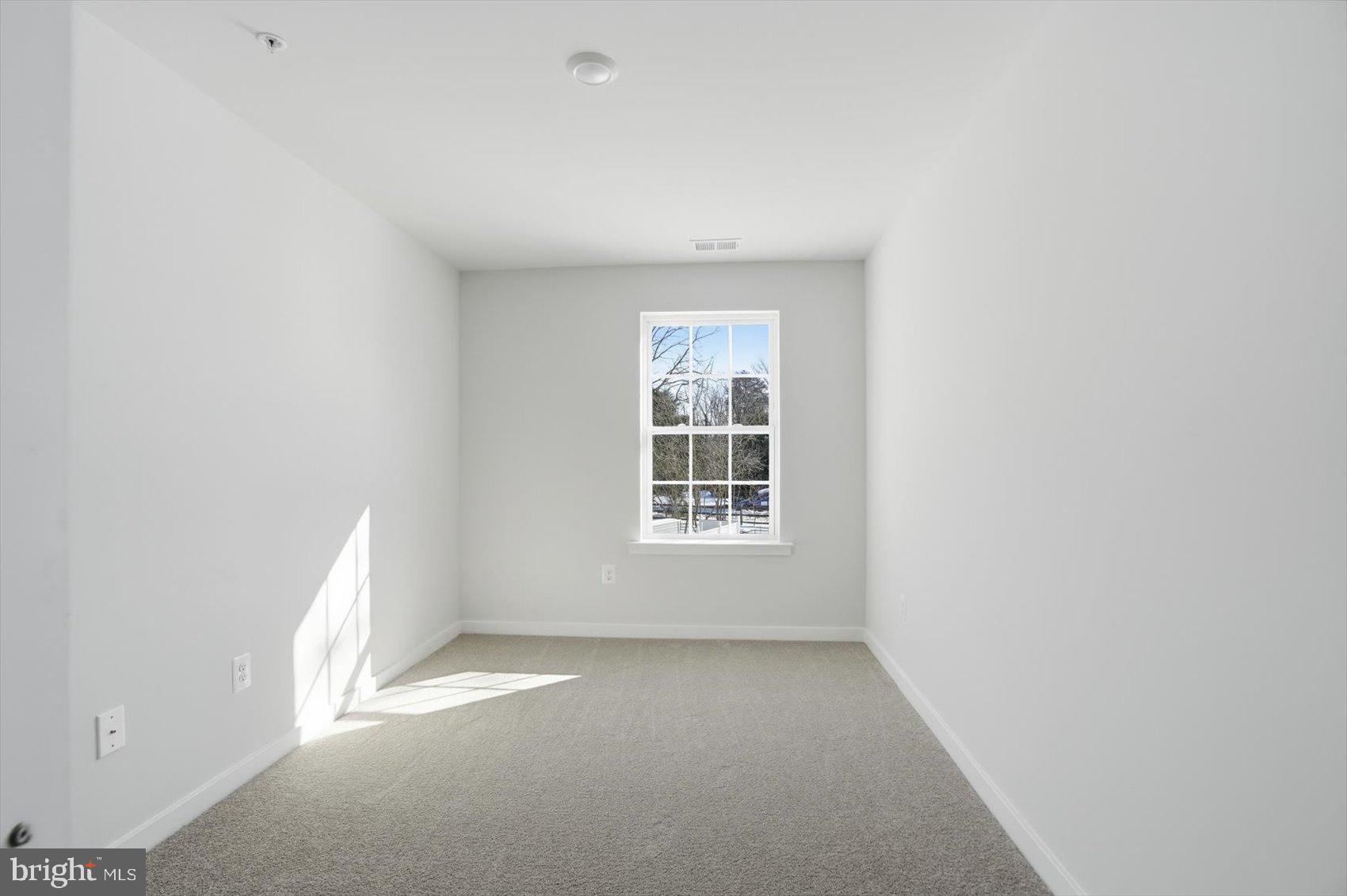 715 Hammonds Lane Baltimore, MD 21225 - Photo 23 of 29 an empty room with a window